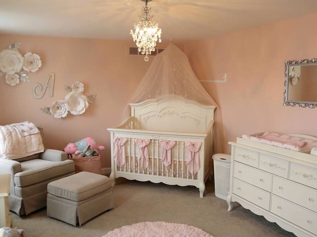 A dream princess nursery in pink and cream featuring the Aurora Nursery Collection in Ivory Lace