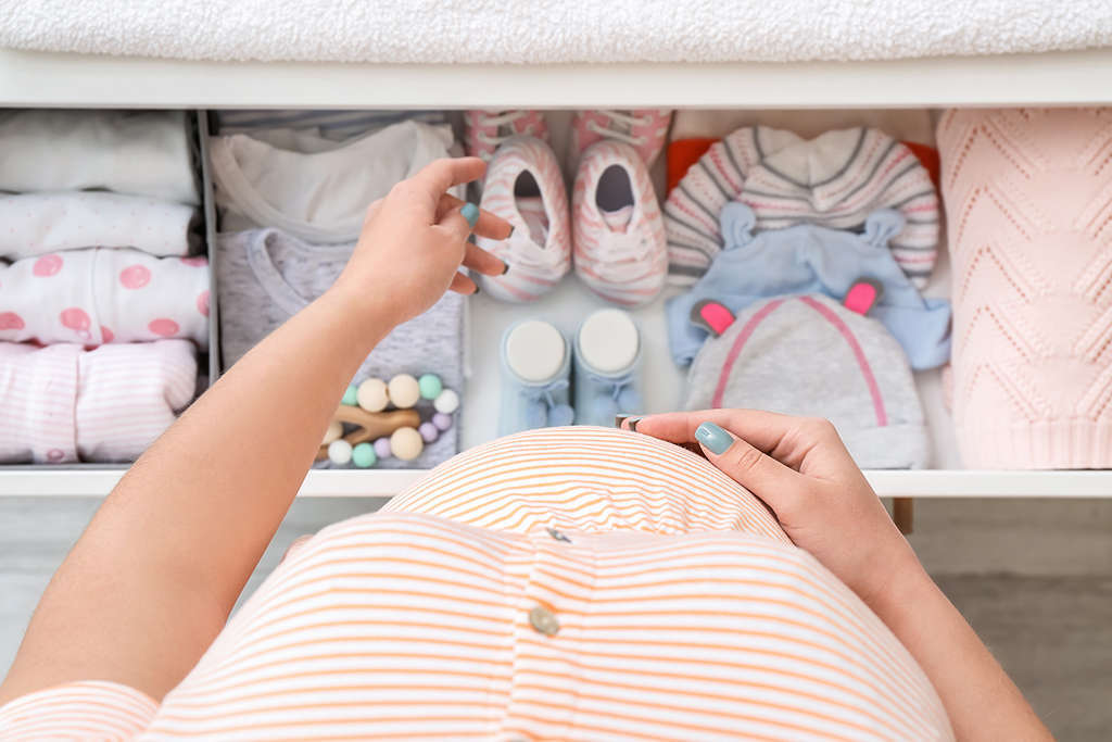 Organize baby clothes in dresser